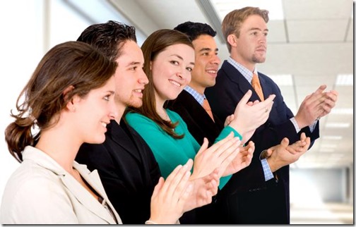 group of business people applauding